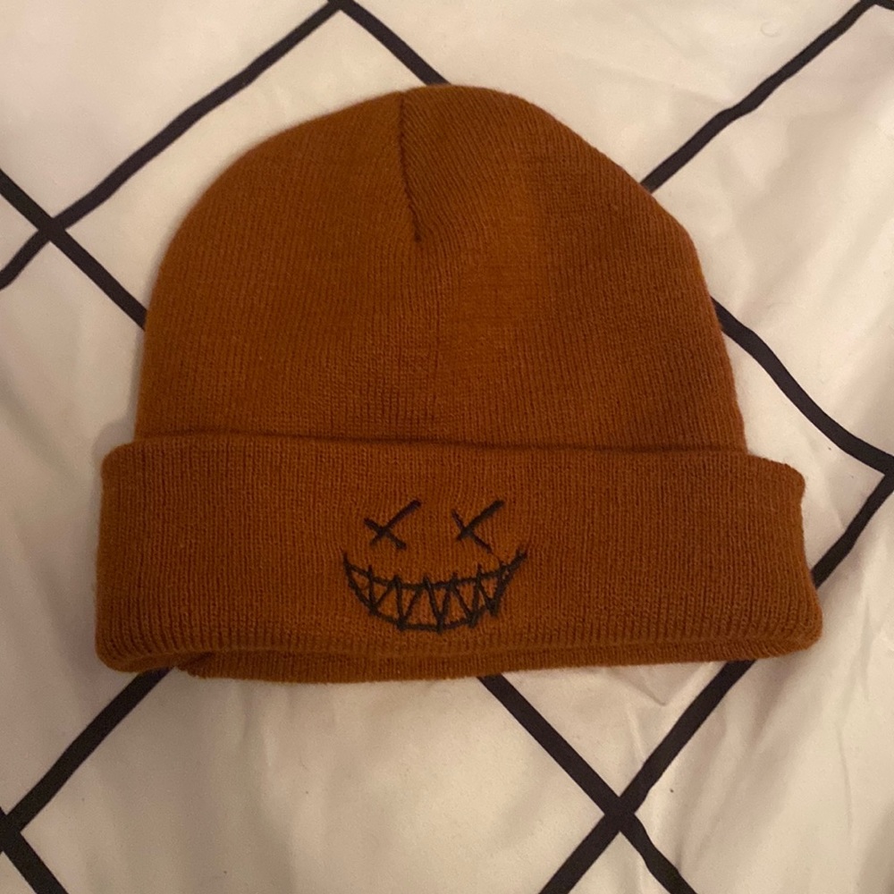 Brown and black beanie